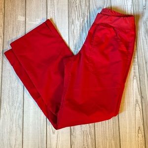 Cherokee red scrub bottoms with pockets. Size XS